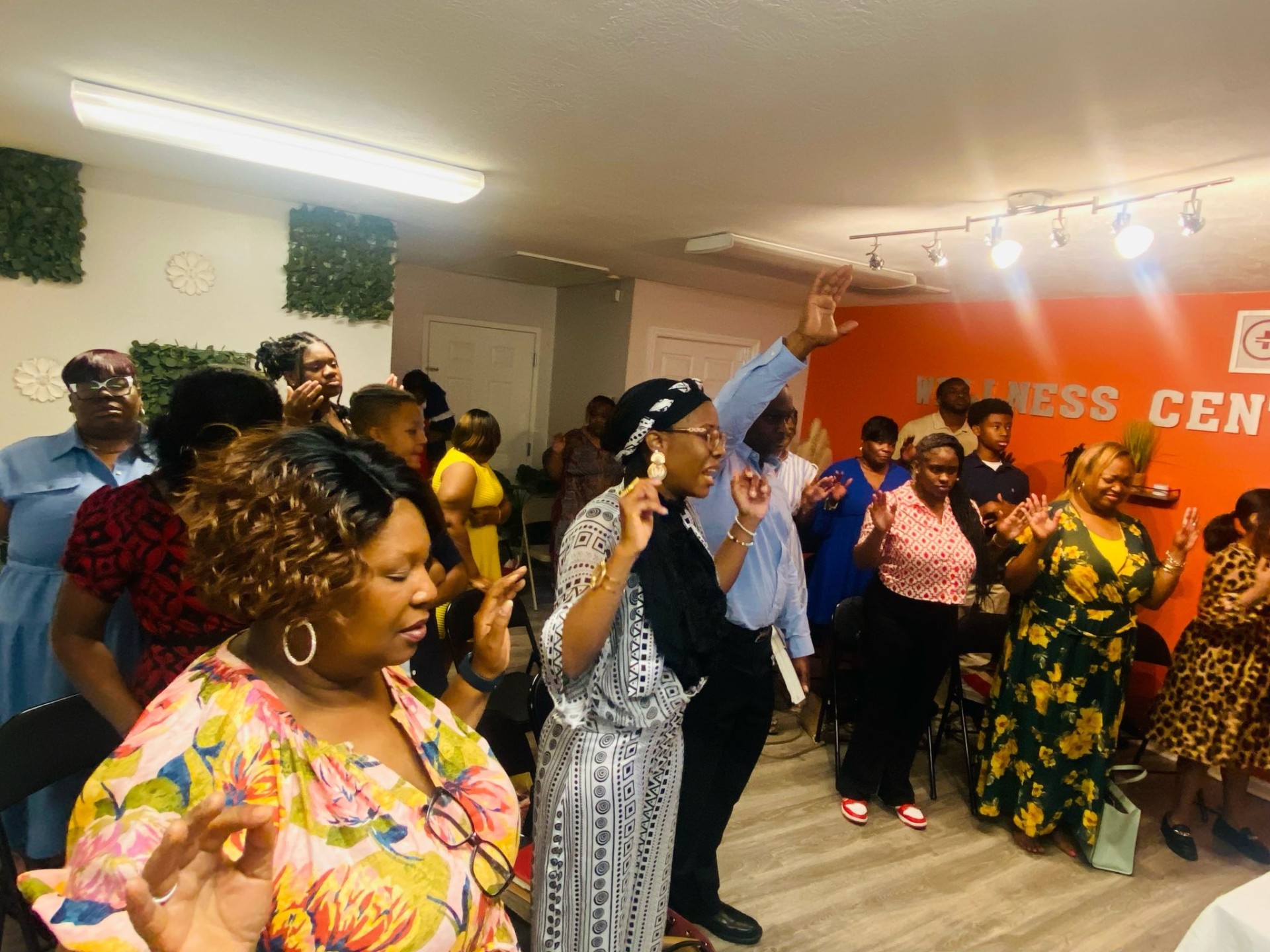 Members of Holy Nation United worshiping together